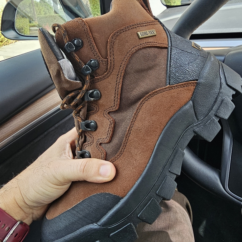 Brown LaCrosse leather hiking boots in men's US size 9M.